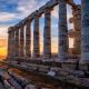 Cape Sounio sunset at Sounion with ruins of the iconic Poseidon temple. One of the Twelve Olympian Gods of ancient Greek religion and mythology. God of the sea, earthquakes. Aegean coast, Greece.