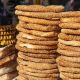 Greek,Koulouri,Stack.,Traditional,Street,Food,,Crispy,Sesame,Bread,Ring